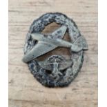 A German WWII NSFK Pilots badge for Powered Aircraft, hollow back example with pin and catch