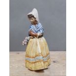 A Lladro porcelain figue, height 34cm. Condition - good, minor wear only.