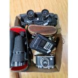 A pair of Delmar Paris binoculars in case together with a pair of Super Zenith binoculars, another