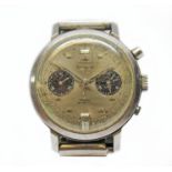 A Dugena stainless steel chronograph wristwatch, circa 1970, diam. 38mm, silvered dial with two