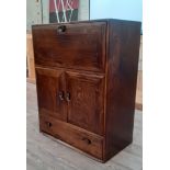 An Ercol 'Windsor' dark elm cabinet/bureau, model 469, height 102cm, width 82.5cm and depth 45cm,