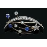 An antique diamond, sapphire and pearl brooch modelled as a crescent moon and shooting star,