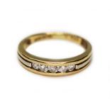 A five stone diamond ring, 18ct gold international convention marks, gross wt. 2.6g, size L.
