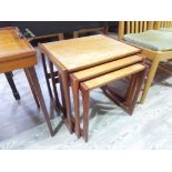 A G-Plan teak nest of tables.