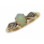 An opal cabochon and diamond ring, band marked '18ct PLAT', gross wt. 2.3g, size N.