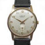An Everite Embassy 9ct gold wristwatch, circa 1960s, case diam. 33mm, leather strap. Condition -