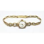 A Uni 21 jewel ladies 9ct gold watch and strap, gross wt. 12.6g.