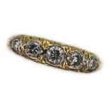 A five stone diamond ring, total approx. diamond wt. 0.30cts, hallmarked 18ct gold, gross wt. 3.