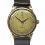An Omega 9ct gold wristwatch, circa 1960, case diam. 34mm, signed champagne dial, numerical and