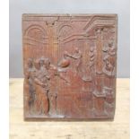 A carved oak panel depicting Bel and the Dragon, from the book of Daniel, 27.5cm x