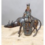 A Chinese bronze incense burner, modelled as a scholar on horse back, gilt and lacquer decoration,