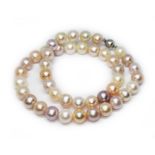 A pearl choker necklace, the uniform peach, cream and pink pearls approx. diam. 9mm to