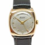 An Audax 9ct gold wristwatch, circa 1940, case width 28mm, silver silvered dial, manual wind