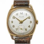 An Avia 9ct gold 15 jewel manual wind wristwatch, case diam. 29mm, leather strap. Condition -