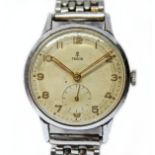 A Rolex Tudor stainless steel wristwatch, circa 1950s, diam. 32mm, signed silvered dial with gilt