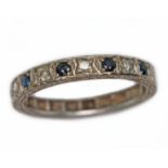 A hallmarked 18ct white gold sapphire and diamond half eternity band, gross wt. 3.7g, size N.