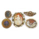 Five 19th century yellow metal brooches comprising two shell cameo, one blue enamel and pearl, one