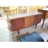 A teak sideboard, length 137cm.