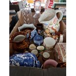 A mixed lot pottery and glass including Wedgwood, glass decanters, Goebel figures, Toby jugs, etc.