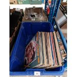 A box of assorted LP vinyl records