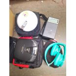 A Sony Walkman together with a Technics portable CD player, a Psion Organiser and a pair of Beats by