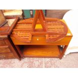 A teak trolley and a folding table.