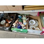 Three boxes of mixed pottery and glassware including novelty teapots, collectors plates, cribbage