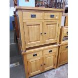 Two light oak cabinets.