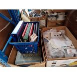 Three boxes of loose stamps, stamp albums and accessories.