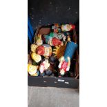 A box of pottery gnomes and Snow White, etc.