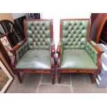 A pair of Gillows style reproduction green leather armchairs.
