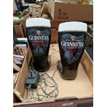 Two light up Guinness pump headers