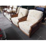 An Ercol ash and beregere three piece suite.