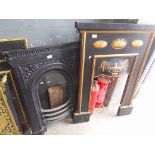 A classical style fire insert and another.