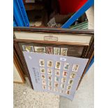 A large collection of cigarette cards to include glazed and framed examples and some silk flags.