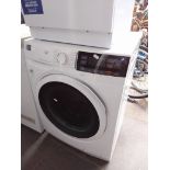 A John Lewis wash and dry 8kg washer dryer.