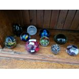 Ten glass paperweights including Caithness ‘Sorcerer’, Sunderland Glass ‘Maya’ etc.