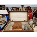 A vintage leather bound case containing a Tunbridgeware Victorian walnut box and a pewter teapot.