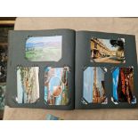 An album of postcards, 20th century, including travel, horses, animals, Royal, etc.