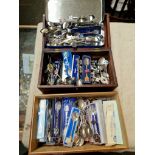 Three boxes of various collectors teaspoons, mostly travel.