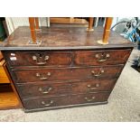 A Geoge III oak chest of drawers, height 84cm, width 102cm, depth 53.5cm.