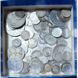 A tray of assorted silver coins to incude half crowns, two shillings & threepences....