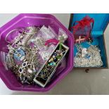 A tub of costume jewellery to include silver, bracelets, charm bracelets, chains, necklaces, etc.