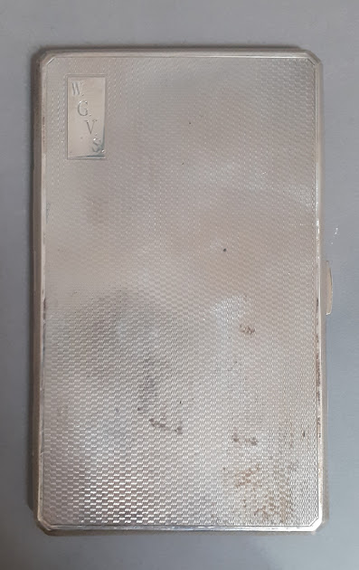 An engine turned hallmarked silver cigarette case, Frederick Field, Birmingham, 1935, gross wt. 6.