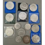 A small box of assorted GB coins to include a 1935 crown, 50p's & Commemorative crowns.