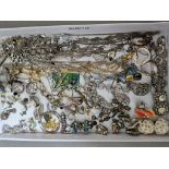 A tray of mainly silver and white metal jewellery to include earrings, chains, etc.