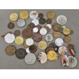 A group of assorted world tokens & commemorative coins etc.