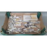 A box of silver plated cutlery to include spoons, forks, etc.