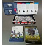 A case of assorted coins to include modern 50ps, 20ps & a catalogue etc..