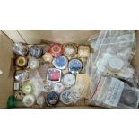 A box of assorted watch movements.